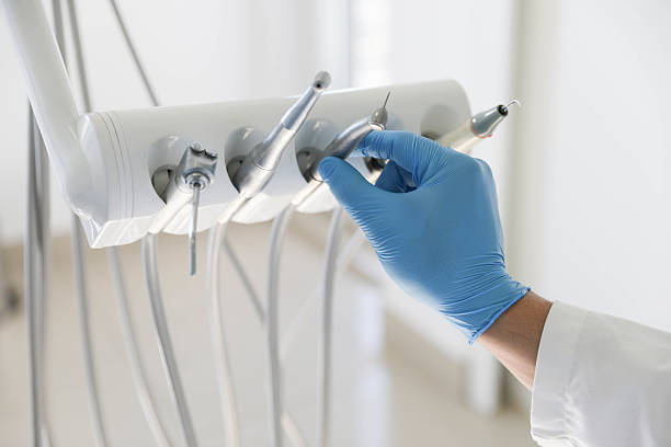 Professional Root Canal Treatment technician working in Douglas, MI